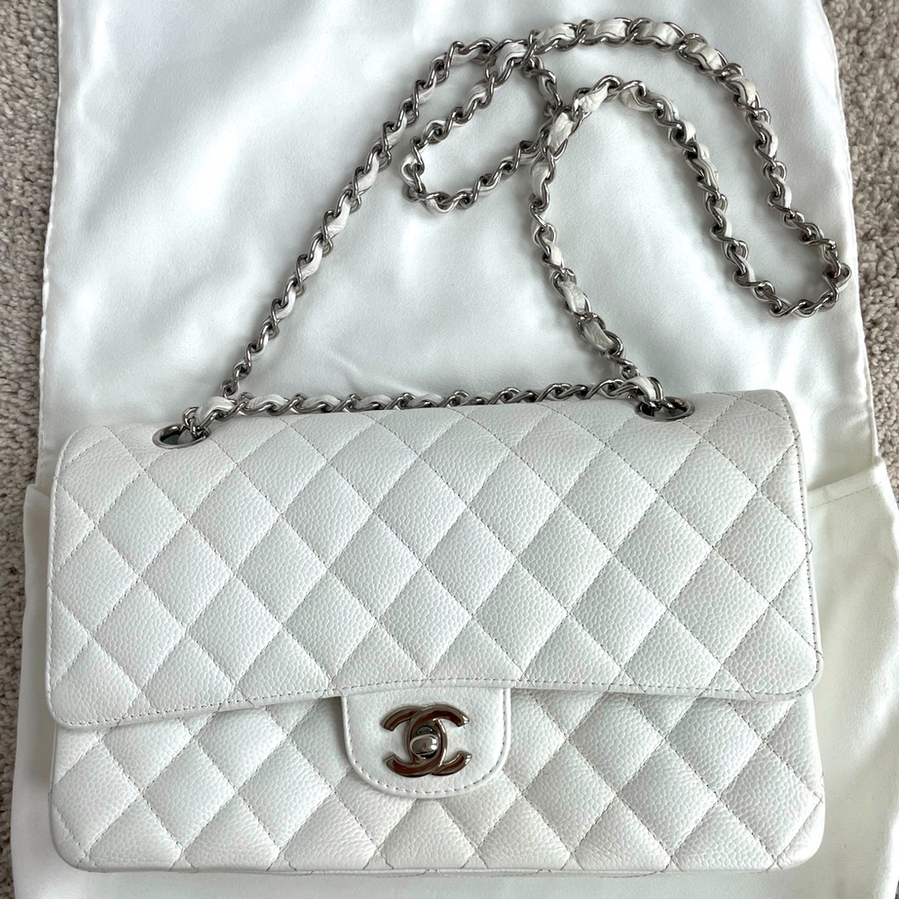 White Chanel Classic Flap bag. Caviar leather, silver hardware, medium size